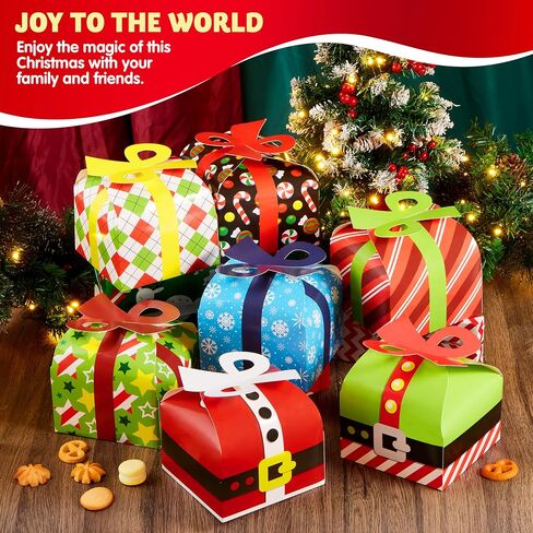 JOYIN 24 PCS 3D Christmas Goodie Boxes with Bow for Holiday Xmas Goodie Paper Boxes, School Classroom Party Favor Supplies, Candy Treat Cardboard Cookie Boxes in Saudi Arabia
