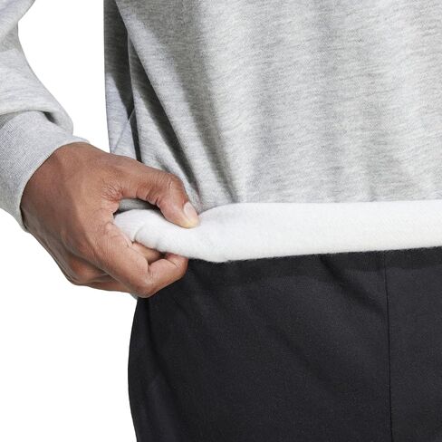 adidas Essentials Fleece 3-Stripes Sweatshirt in Saudi Arabia