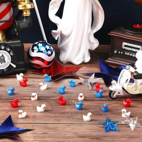 100 Pcs Christmas Mini Ducks, Luminous Glitter Ducks Mini Resin Duck Glow in Dark Christmas Hat Duck Ornament for Xmas DIY Craft Home Party Favors Decorations in Kuwait