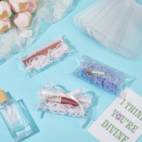BENECREAT 60Pcs Clear Plastic Pillow Favor Box Candy Treat Gift Box for Wedding Party Favor, Mother's Day Festival Gift Packaging, 4.5x2.5x1 inch in Saudi Arabia