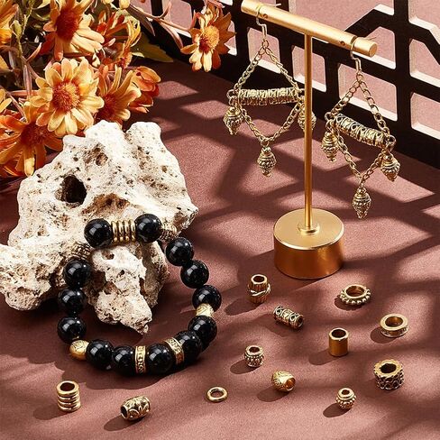 NBEADS 120 Pcs Alloy Hair Bead, 12 Styles Tibetan Gold Spacer Beads Large Hole Dreadlock Bead for Hair Braids, Beard, Bracelet, Necklace, Jewelry Making in Saudi Arabia