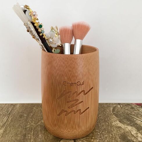 Bamboo wood artwork cylinder as container or kitchen utensil or holder for pens, pencils, brushes, makeup brushes, straws, chopsticks, flatware, pipe cleaners, etc. in Saudi Arabia