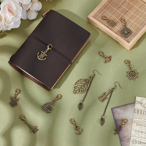 Benecreat 12 Styles Traveler's Notebook Charms Vintage ، سحر سوار مع مشابك جراد البحر لصنع المجوهرات ، ديكور دفاتر ، معلقات السبائك الذهبية العتيقة لمخطط اليومية ، القلادة ، سلسلة المفاتيح in Kuwait