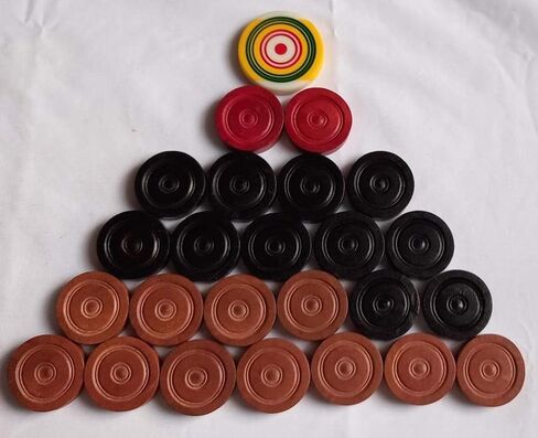 Carrom Board Wood Coins 24-Coins 1-Striker المستخدمة في بطولة Carrom الدولية بنسبة 100 ٪ in Saudi Arabia