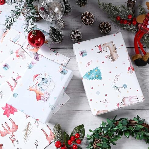 Bolsome 12 Sheets Christmas Wrapping Paper Blue White Reindeer Xmas Tree Snowflake Printed Gift Wrap Paper for Baby Shower Birthday Party Winter Holidays DIY Craft Supplies, 19.7 × 27.5 Inch in Saudi Arabia