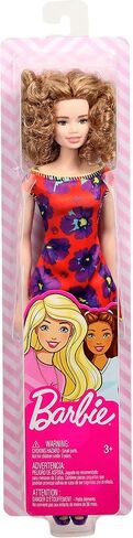 Barbie GBK92 Doll ، امرأة سمراء Auburn Curly Light ترتدي فستان أزهار أحمر وأرجواني in Saudi Arabia