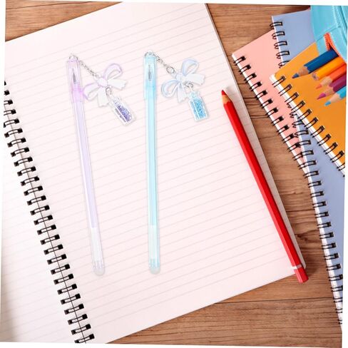 صمم 8pcs glitter bow pendant أقلام محمولة من طلاب الكتابة المحمولة للمدرسة والمكاتب القابلة للسحب الحبر القابل للتراجع عن قرطاسية الكتابة العشوائية in Kuwait