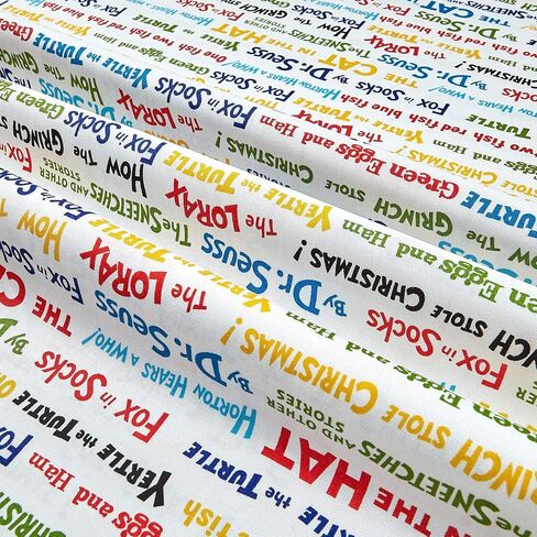 Robert Kaufman DI-494 Celebrate Seuss! Book Titles Fabric by The Yard, White in Saudi Arabia