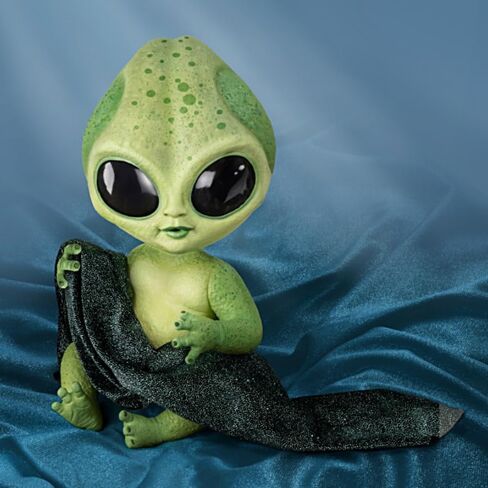 The Ashton-Drake Galleries Lumina Alien Baby Doll, 16 inches, Glow-in-The Dark Vinyl Skin, Poseable with Cosmic Blanket in Saudi Arabia
