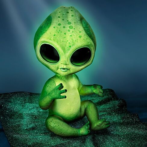 The Ashton-Drake Galleries Lumina Alien Baby Doll, 16 inches, Glow-in-The Dark Vinyl Skin, Poseable with Cosmic Blanket in Saudi Arabia