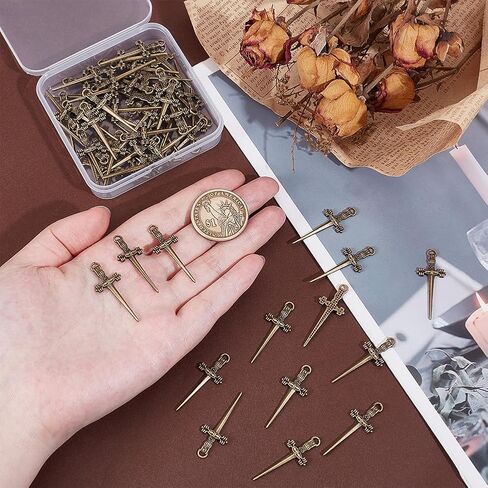 UNICRAFTALE 60Pcs Sword Bookmark Swords Charms Mini Bookmark Charms Tibetan Style Metal Pendants for Book Lovers Presents Reading Crafting DIY Necklace Bracelet Jewelry in Saudi Arabia