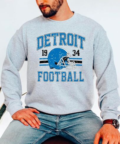 الزيتون يحب Apple Vintage Detroit 1934 كرة القدم من النوع الثقيل للرجال للنساء والأطفال الأزرق والأسود pullover in Kuwait