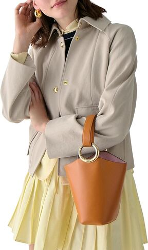 kate spade new york Halo Fine Grain Leather Mini Bucket, Glazed Hot Fudge in Kuwait