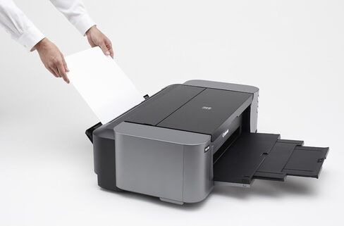 طابعة Canon Pixma Pro-100 اللاسلكية الملونة الاحترافية النافثة للحبر مع طباعة Airprint وطباعة الأجهزة المحمولة، تتضمن حبر Canon CLI-42 8 PK Value Pack in Saudi Arabia