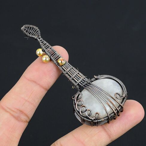 Guitar Shaped Gemstone Pendant Copper Wire Wrapped Jewelry Necklace in Saudi Arabia