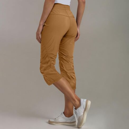 Womens Athletic Capri Pants Side Luched Capris تمرينات خفيفة الوزن يركض الركض مع جيوب in Kuwait
