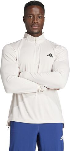 adidas Training Essentials 1/4 Zip Sweatshirt in Saudi Arabia