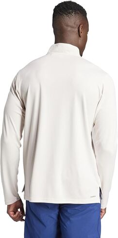 adidas Training Essentials 1/4 Zip Sweatshirt in Saudi Arabia