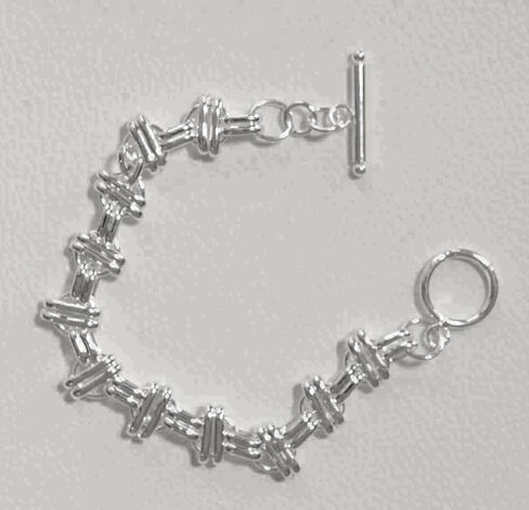 Sterling Silver Fancy Double Bar over Spaced Circles Design Bracelet with Toggle Clasp 7" in Saudi Arabia