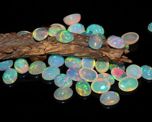 Natural Ethiopian Multi Fire Opal Cabochon Gemstone Oval Shape 6x8 mm 1 Piece for Jewelry Making in Saudi Arabia