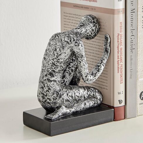 Danya B. Kneeling Figure Sculptures Polyresin Silver and Black Finish Bookend Set of 2 in Saudi Arabia