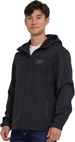 Reebok Waterproof Soft Shell Jacket Mens - Micro Fleece Bonded Softshell Windbreaker with Hood, Lightweight Rain Coat in Saudi Arabia
