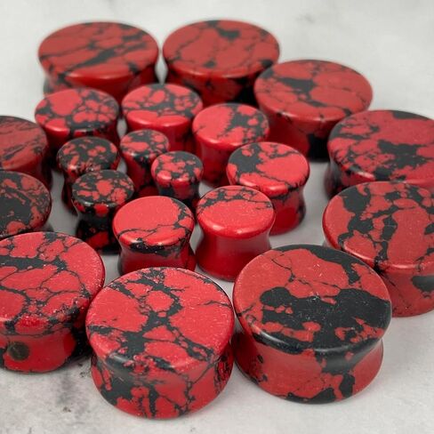 Pair of Synthetic Red and Black Howlite Double Flare Plugs (STN-656) in Saudi Arabia