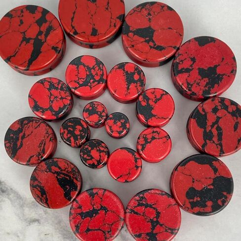 Pair of Synthetic Red and Black Howlite Double Flare Plugs (STN-656) in Saudi Arabia