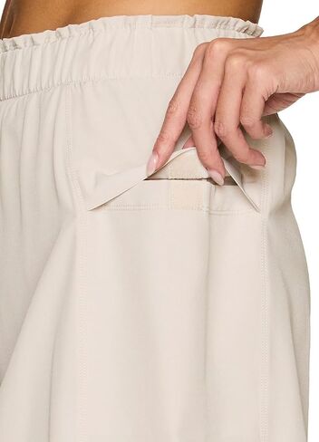 RBX Active Skort for Women, Longer Length Cargo-Style Quick Drying Hiking Tennis Skirt with Inner Compression Short in Saudi Arabia