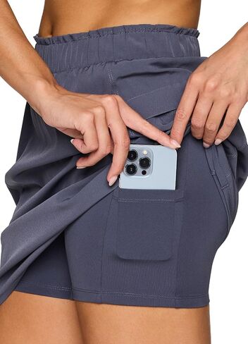 RBX Active Skort for Women, Longer Length Cargo-Style Quick Drying Hiking Tennis Skirt with Inner Compression Short in Saudi Arabia