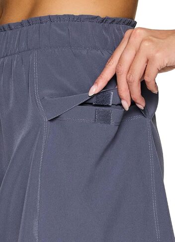 RBX Active Skort for Women, Longer Length Cargo-Style Quick Drying Hiking Tennis Skirt with Inner Compression Short in Saudi Arabia