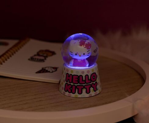 Sanrio Hello Kitty Polka Dots Mini Light-Up Snow Globe مع عرض بريق دوار | 3 بوصات طولها in Kuwait