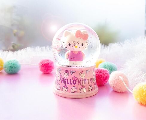 Sanrio Hello Kitty Light-Up Comple Snow Globe مع عرض بريق دوار | 6 بوصات in Kuwait