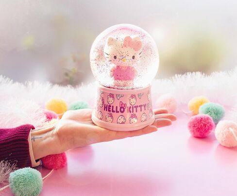 Sanrio Hello Kitty Light-Up Comple Snow Globe مع عرض بريق دوار | 6 بوصات in Kuwait