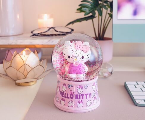 Sanrio Hello Kitty Light-Up Comple Snow Globe مع عرض بريق دوار | 6 بوصات in Kuwait