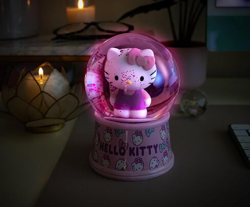 Sanrio Hello Kitty Light-Up Comple Snow Globe مع عرض بريق دوار | 6 بوصات in Kuwait