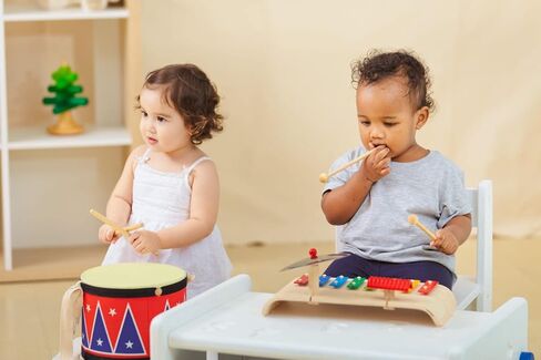 PlanToys Musical Band Toddler Drum Set Sustainably-Made with 2 Different-Sized Drums, Pair of Rubber-Coated Drumsticks, Cymbal, and Guiro to Explore Creativity in Saudi Arabia