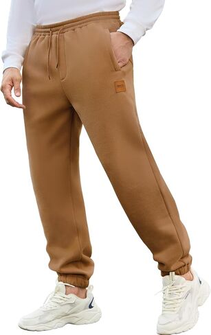 Mens Fleece Sweatpants Loose Fit Tapered Joggers with Drawstring Waist and Pockets Warm Casual Workout Pants in Saudi Arabia
