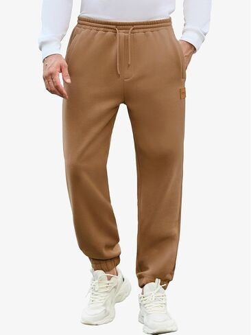 Mens Fleece Sweatpants Loose Fit Tapered Joggers with Drawstring Waist and Pockets Warm Casual Workout Pants in Saudi Arabia