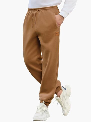 Mens Fleece Sweatpants Loose Fit Tapered Joggers with Drawstring Waist and Pockets Warm Casual Workout Pants in Saudi Arabia