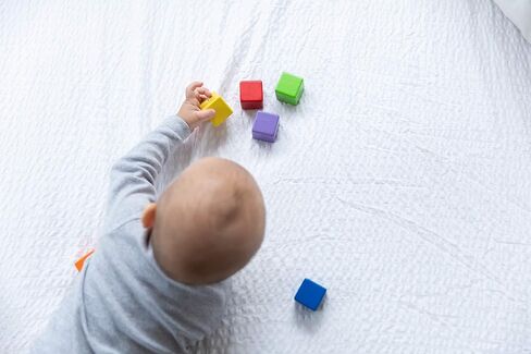 PlanToys Wooden Sensory Tumbling Baby Development Toy (5242) | Sustainably Made from Rubberwood and Non-Toxic Paints and Dyes in Saudi Arabia