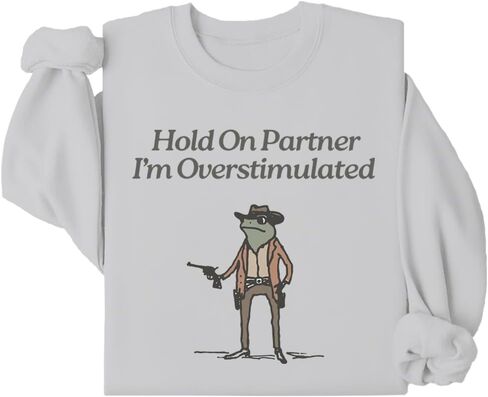 Hold On Im Overstimulated Sweatshirt Hold On Partner I'm Overstimulated Sweatshirt Funny Cowboy Frog Graphic Shirt in Saudi Arabia