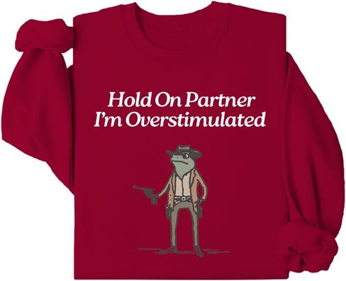 Hold On Im Overstimulated Sweatshirt Hold On Partner I'm Overstimulated Sweatshirt Funny Cowboy Frog Graphic Shirt in Saudi Arabia