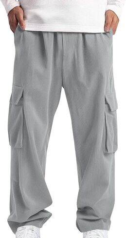 سروال قصير للرجال فضفاض غير رسمي واسع الساق Sweatpants مع جيوب متعددة مرونة الخصر فضفاضة تناسب الشارع الشهير السراويل in Saudi Arabia
