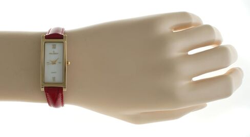 Peugeot Women's Slim 14K Gold Plated White Mother of Pearl Face Roman Numeral Brown Leather Thin Strap Dress Watch 3017BR in Kuwait