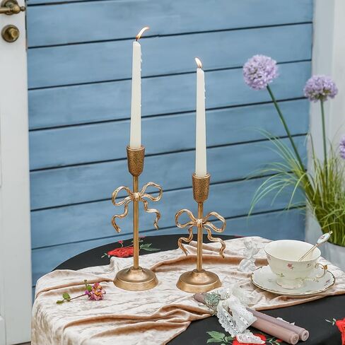 NIKKY HOME Gold Bow Iron Taper Candle Holders Set of 2, Vintage Decorative Tall Candlesticks Centerpieces Decor for Dining Room Table Wedding Party Mantle Fireplace Housewarming Gift in Saudi Arabia