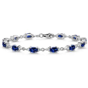 Gem Stone King 925 Sterling Silver Blue Created Sapphire and White Moissanite Tennis Bracelet For Women (8.11 Cttw, Gemstone Birthstone, Oval 6X4MM, 7.5 Inch)