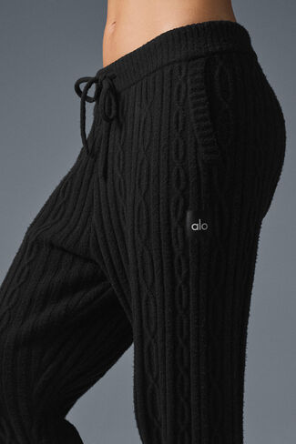 بنطال Alo Yoga Cable Knit Winter Bliss - أسود in Saudi Arabia