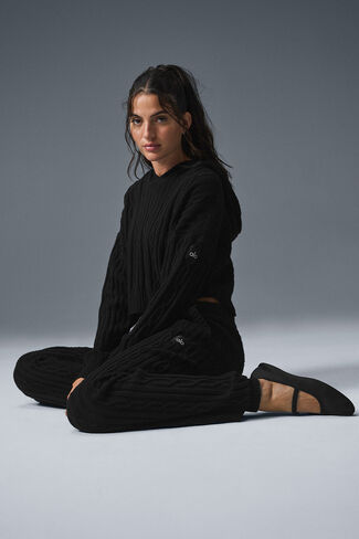 هودي Alo Yoga Cable Knit Winter Bliss - أسود in Saudi Arabia