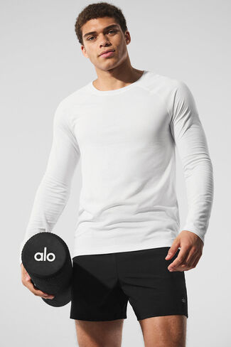 Alo Yoga Triumph Long Sleeve Tee - White in Saudi Arabia